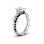 Load image into Gallery viewer, oval-shaped-diamond-bezel-solitaire-ring-with-black-diamond-band-in-white-gold-FD11229OVGBLACKANGLE2-NL-WG_b164b75c-eb55-4e26-8c2d-81ecd5255b8b.jpg?v=1758702938
