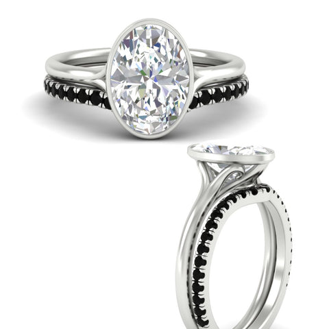 oval-shaped-diamond-bezel-solitaire-ring-with-black-diamond-band-in-white-gold-FD11229OVGBLACKANGLE3-NL-WG_363b1e9a-052a-4fb3-860e-5fe7b746ddb4.jpg?v=1758702938