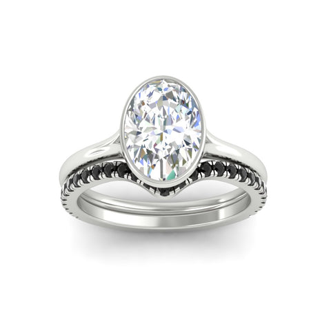oval-shaped-diamond-bezel-solitaire-ring-with-black-diamond-band-in-white-gold-FD11229OVGBLACKANGLE5-NL-WG_bcc366ba-07b5-4cc1-9a8a-e8b354f8e98f.jpg?v=1758702938