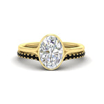 Load image into Gallery viewer, oval-shaped-diamond-bezel-solitaire-ring-with-black-diamond-band-in-yellow-gold-FD11229OVGBLACK-NL-YG_65e91046-011b-4d9d-9bd4-3a703ff48f38.jpg?v=1758702938
