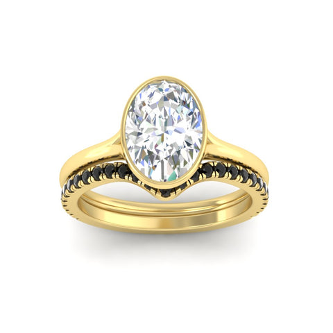 oval-shaped-diamond-bezel-solitaire-ring-with-black-diamond-band-in-yellow-gold-FD11229OVGBLACKANGLE5-NL-YG.jpg?v=1758702860