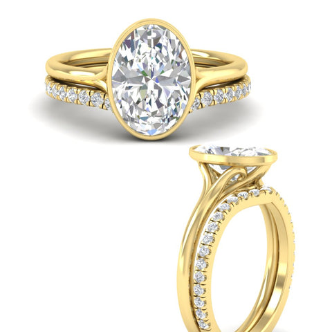 oval-shaped-diamond-bezel-solitaire-ring-with-diamond-band-in-yellow-gold-FD11229OVANGLE3-NL-YG.jpg?v=1758702860