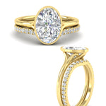 Load image into Gallery viewer, oval-shaped-diamond-bezel-solitaire-ring-with-diamond-band-in-yellow-gold-FD11229OVANGLE3-NL-YG_eb5b2e9e-0113-421e-987f-e366ef47b7de.jpg?v=1758702938
