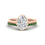 Load image into Gallery viewer, oval-shaped-diamond-bezel-solitaire-ring-with-emerald-band-in-rose-gold-FD11229OVGEMGR-NL-RG_72c7859d-f082-496e-93fd-b86134de4422.jpg?v=1758702938
