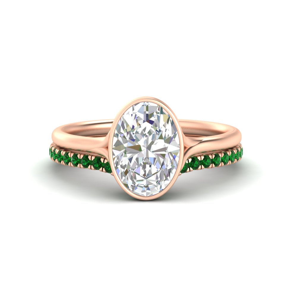 oval-shaped-diamond-bezel-solitaire-ring-with-emerald-band-in-rose-gold-FD11229OVGEMGR-NL-RG_72c7859d-f082-496e-93fd-b86134de4422.jpg?v=1758702938