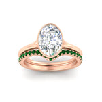 Load image into Gallery viewer, oval-shaped-diamond-bezel-solitaire-ring-with-emerald-band-in-rose-gold-FD11229OVGEMGRANGLE5-NL-RG_317de3d1-fe7f-4131-bc8c-1dd69c10c8d5.jpg?v=1758702938
