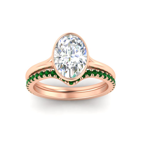 oval-shaped-diamond-bezel-solitaire-ring-with-emerald-band-in-rose-gold-FD11229OVGEMGRANGLE5-NL-RG.jpg?v=1758702860