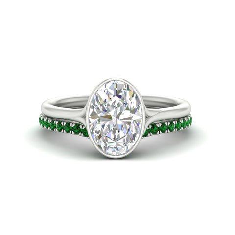 oval-shaped-diamond-bezel-solitaire-ring-with-emerald-band-in-white-gold-FD11229OVGEMGR-NL-WG.jpg?v=1758702860