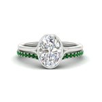 Load image into Gallery viewer, oval-shaped-diamond-bezel-solitaire-ring-with-emerald-band-in-white-gold-FD11229OVGEMGR-NL-WG_db90d99e-854d-4467-8348-bb18cb8307ba.jpg?v=1758702938
