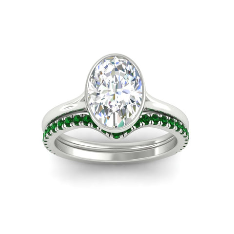 oval-shaped-diamond-bezel-solitaire-ring-with-emerald-band-in-white-gold-FD11229OVGEMGRANGLE5-NL-WG.jpg?v=1758702860