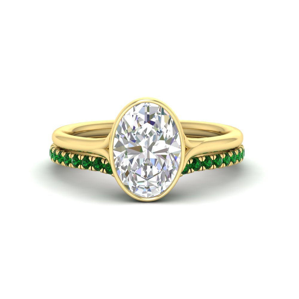 oval-shaped-diamond-bezel-solitaire-ring-with-emerald-band-in-yellow-gold-FD11229OVGEMGR-NL-YG_249dfcdf-a526-4213-9a42-0769778053e7.jpg?v=1758702938