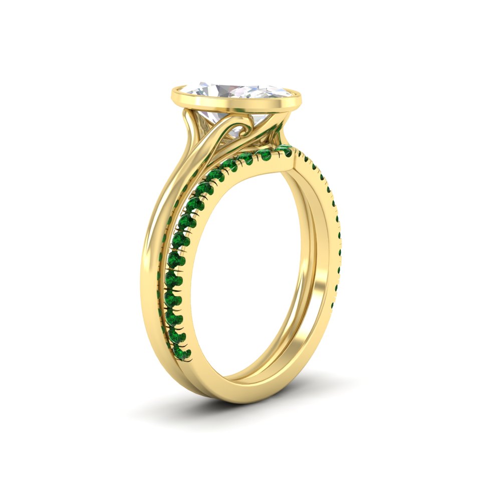 oval-shaped-diamond-bezel-solitaire-ring-with-emerald-band-in-yellow-gold-FD11229OVGEMGRANGLE2-NL-YG_c2187f14-11df-4931-a835-12e77100619d.jpg?v=1758702938