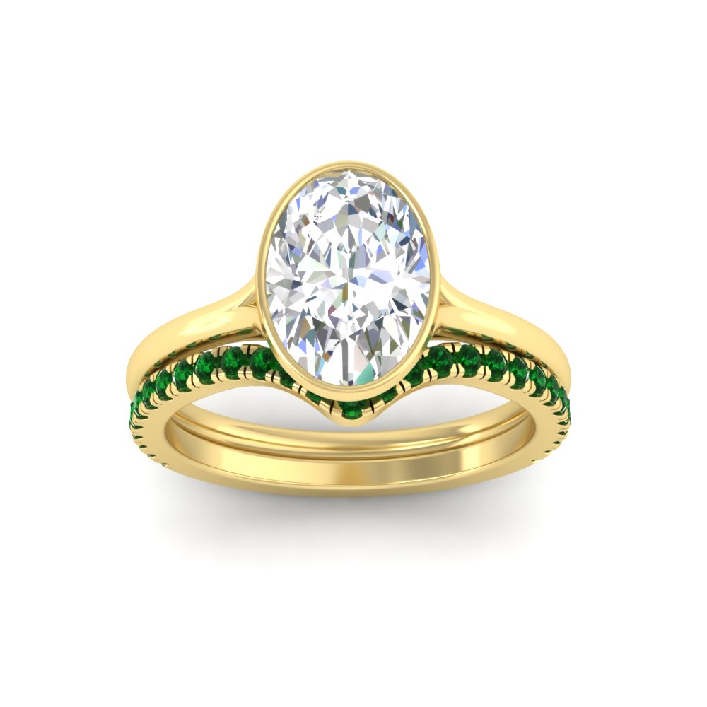 oval-shaped-diamond-bezel-solitaire-ring-with-emerald-band-in-yellow-gold-FD11229OVGEMGRANGLE5-NL-YG_9b58e42e-85fe-4336-a270-2c01da472275.jpg?v=1758702938