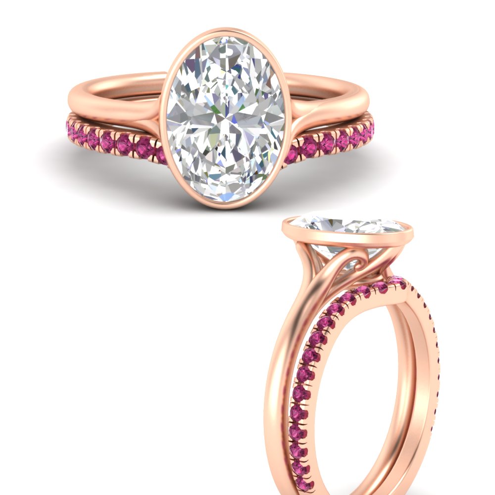 oval-shaped-diamond-bezel-solitaire-ring-with-pink-sapphire-band-in-rose-gold-FD11229OVGSADRPIANGLE3-NL-RG_8080337a-7f9f-4662-864e-1b89b64b785e.jpg?v=1758702937