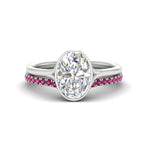 Load image into Gallery viewer, oval-shaped-diamond-bezel-solitaire-ring-with-pink-sapphire-band-in-white-gold-FD11229OVGSADRPI-NL-WG_024c4388-5008-424a-9afa-c996c0cb6479.jpg?v=1758702938
