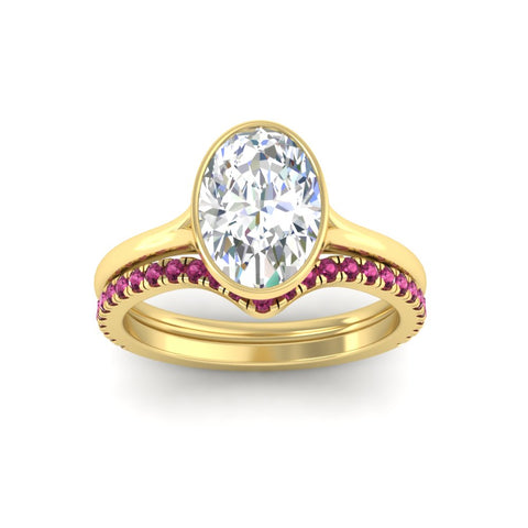 oval-shaped-diamond-bezel-solitaire-ring-with-pink-sapphire-band-in-yellow-gold-FD11229OVGSADRPIANGLE5-NL-YG.jpg?v=1758702860