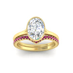 Load image into Gallery viewer, oval-shaped-diamond-bezel-solitaire-ring-with-pink-sapphire-band-in-yellow-gold-FD11229OVGSADRPIANGLE5-NL-YG_eadbc2e5-2471-4647-b248-b5a4bf3b3451.jpg?v=1758702938
