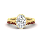 Load image into Gallery viewer, oval-shaped-diamond-bezel-solitaire-ring-with-ruby-band-in-yellow-gold-FD11229OVGRUDR-NL-YG_5c44b25a-4fc3-42dd-84d8-db6d5c94fa32.jpg?v=1758702938
