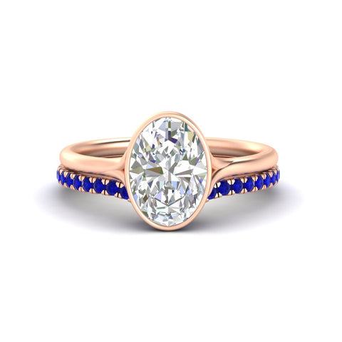 oval-shaped-diamond-bezel-solitaire-ring-with-sapphire-band-in-rose-gold-FD11229OVGSABL-NL-RG_c6080968-5692-49e0-9cf1-57436c9366dc.jpg?v=1758702938