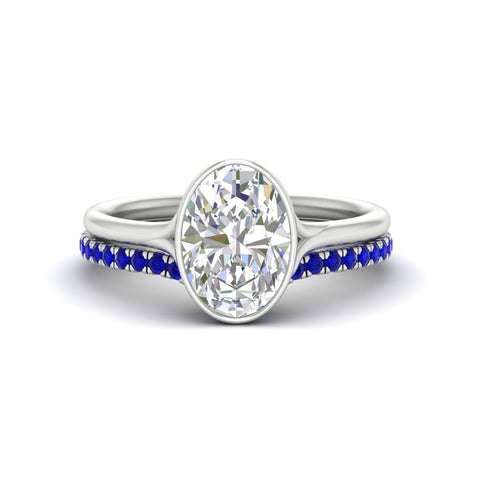 oval-shaped-diamond-bezel-solitaire-ring-with-sapphire-band-in-white-gold-FD11229OVGSABL-NL-WG_df2a17df-9f7c-411d-8148-4d80c5952fdc.jpg?v=1758702938