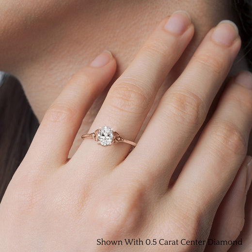 oval-shaped-diamond-celtic-solitaire-ring-in-rose-gold-FD8541R-OVR-RG-HAND?v=1758624157