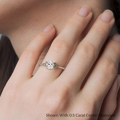 oval-shaped-diamond-celtic-solitaire-ring-in-white-gold-FD8541R-OVR-WG-HAND?v=1758624156