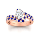 Load image into Gallery viewer, oval-shaped-diamond-wedding-ring-set-with-sapphire-in-FDENS3007OVGSABL-NL-RG
