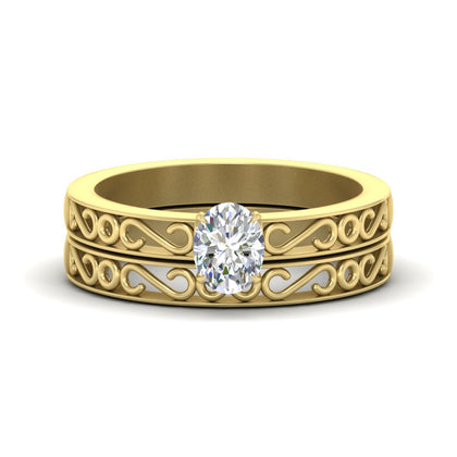 oval-shaped-filigree-single-stone-diamond-wedding-ring-set-in-yellow-gold-FDENS3289OV-NL-YG.jpg?v=1763371069