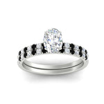 Load image into Gallery viewer, oval-shaped-french-pave-black-diamond-wedding-ring-set-in-white-gold-FD11408OVGBLACKANGLE5-NL-WG_639335c1-ce24-4a26-aaea-39d413bffbda?v=1763104443

