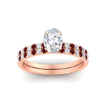 Load image into Gallery viewer, oval-shaped-french-pave-ruby-wedding-ring-set-in-rose-gold-FD11408OVGRUDRANGLE5-NL-RG_8096fa19-9eab-4a35-a86a-ef1005023887?v=1763104442
