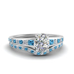 Load image into Gallery viewer, oval-shaped-graduated-channel-diamond-wedding-set-with-blue-topaz-in-FD122866OVGICBLTO-NL-WG
