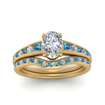 Load image into Gallery viewer, oval-shaped-graduated-channel-diamond-wedding-set-with-blue-topaz-in-FD122866OVGICBLTO-NL-YG
