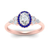 Load image into Gallery viewer, oval-shaped-halo-cluster-accent-sapphire-engagement-ring-in-rose-gold-FD10512OVRGSABLANGLE5-NL-RG_6470c36c-6b41-40cd-b04e-79b1b9131718.jpg?v=1770117370