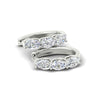 Load image into Gallery viewer, oval-shaped-huggie-hoops-3-stone-earrings-in-white-gold-fdear11727angle5-nl-wg_dd694e1e-e067-4b9c-9a0c-95bea3ad944e.jpg?v=1776316096