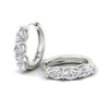 Load image into Gallery viewer, oval-shaped-huggie-hoops-3-stone-earrings-in-white-gold-fdear11727angle6-nl-wg_7e74cafd-49cb-4e3f-8c60-c0bd8a76173f.jpg?v=1776316096