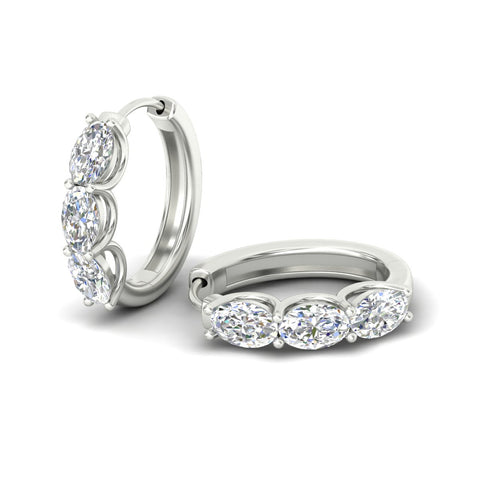 oval-shaped-huggie-hoops-3-stone-earrings-in-white-gold-fdear11727angle6-nl-wg_7e74cafd-49cb-4e3f-8c60-c0bd8a76173f.jpg?v=1776316096