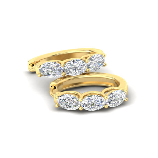 oval-shaped-huggie-hoops-3-stone-earrings-in-yellow-gold-fdear11727angle5-nl-yg_ed15595c-e278-4777-be6c-70aabfe157eb.jpg?v=1776316096