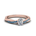 Load image into Gallery viewer, oval-shaped-infinity-twist-diamond-engagement-ring-with-ice-blue-topaz-in-14K-rose-gold-FD8253OVRGICBLTO-NL-RG
