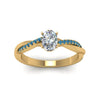 Load image into Gallery viewer, oval-shaped-infinity-twist-diamond-engagement-ring-with-ice-blue-topaz-in-14K-yellow-gold-FD8253OVRGICBLTO-NL-YG