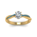 Load image into Gallery viewer, oval-shaped-infinity-twist-diamond-engagement-ring-with-ice-blue-topaz-in-14K-yellow-gold-FD8253OVRGICBLTO-NL-YG
