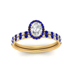 Load image into Gallery viewer, oval-shaped-sapphire-halo-wedding-ring-set-in-yellow-gold-FD8523OVGSABL-NL-YG
