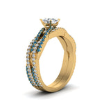 Load image into Gallery viewer, oval-shaped-simple-diamond-twisted-vine-bridal-ring-sets-with-ice-blue-topaz-in-14K-yellow-gold-FD8233OVGICBLTO-NL-YG
