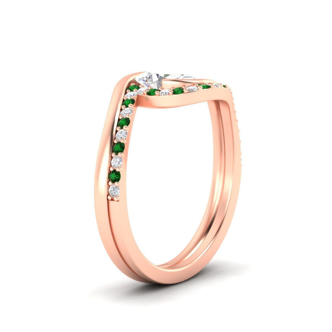 oval-shaped-swirl-emerald-wedding-band-set-in-rose-gold-fdens7806ovvtgemgrangle2-nl-rg.jpg?v=1759991270
