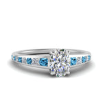 Load image into Gallery viewer, oval-shaped-swirl-engraved-channel-accent-diamond-engagement-ring-with-blue-topaz-in-FD122866OVRGICBLTO-NL-WG