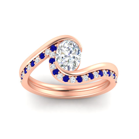 oval-shaped-swirl-sapphire-wedding-band-set-in-rose-gold-fdens7806ovvtgsablangle5-nl-rg_47c4f10e-f190-4687-bbf3-7ac55f82a71a.jpg?v=1759991325