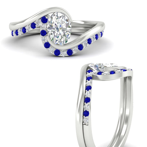 oval-shaped-swirl-sapphire-wedding-band-set-in-white-gold-fdens7806ovvtgsablangle3-nl-wg_7223415c-bac1-4d5f-8c57-f555b55222d9.jpg?v=1759991325