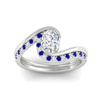Load image into Gallery viewer, oval-shaped-swirl-sapphire-wedding-band-set-in-white-gold-fdens7806ovvtgsablangle5-nl-wg.jpg?v=1759991270
