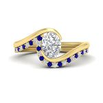Load image into Gallery viewer, oval-shaped-swirl-sapphire-wedding-band-set-in-yellow-gold-fdens7806ovvtgsabl-nl-yg.jpg?v=1759991270
