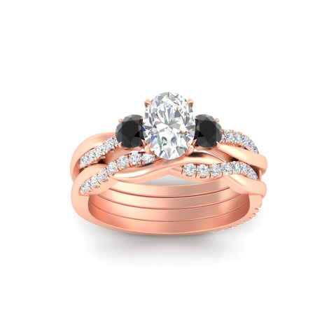 oval-shaped-three-stone-twisted-black-diamond-wedding-band-in-rose-gold-fdens3301ovgblackangle5-nl-rg.jpg