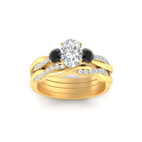 oval-shaped-three-stone-twisted-black-diamond-wedding-band-in-yellow-gold-fdens3301ovgblackangle5-nl-yg.jpg